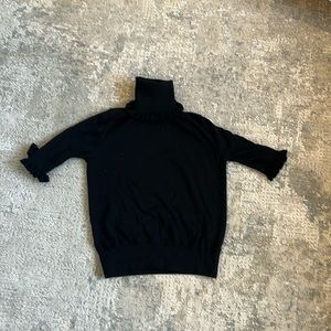 Micheal Kors turtle neck top.